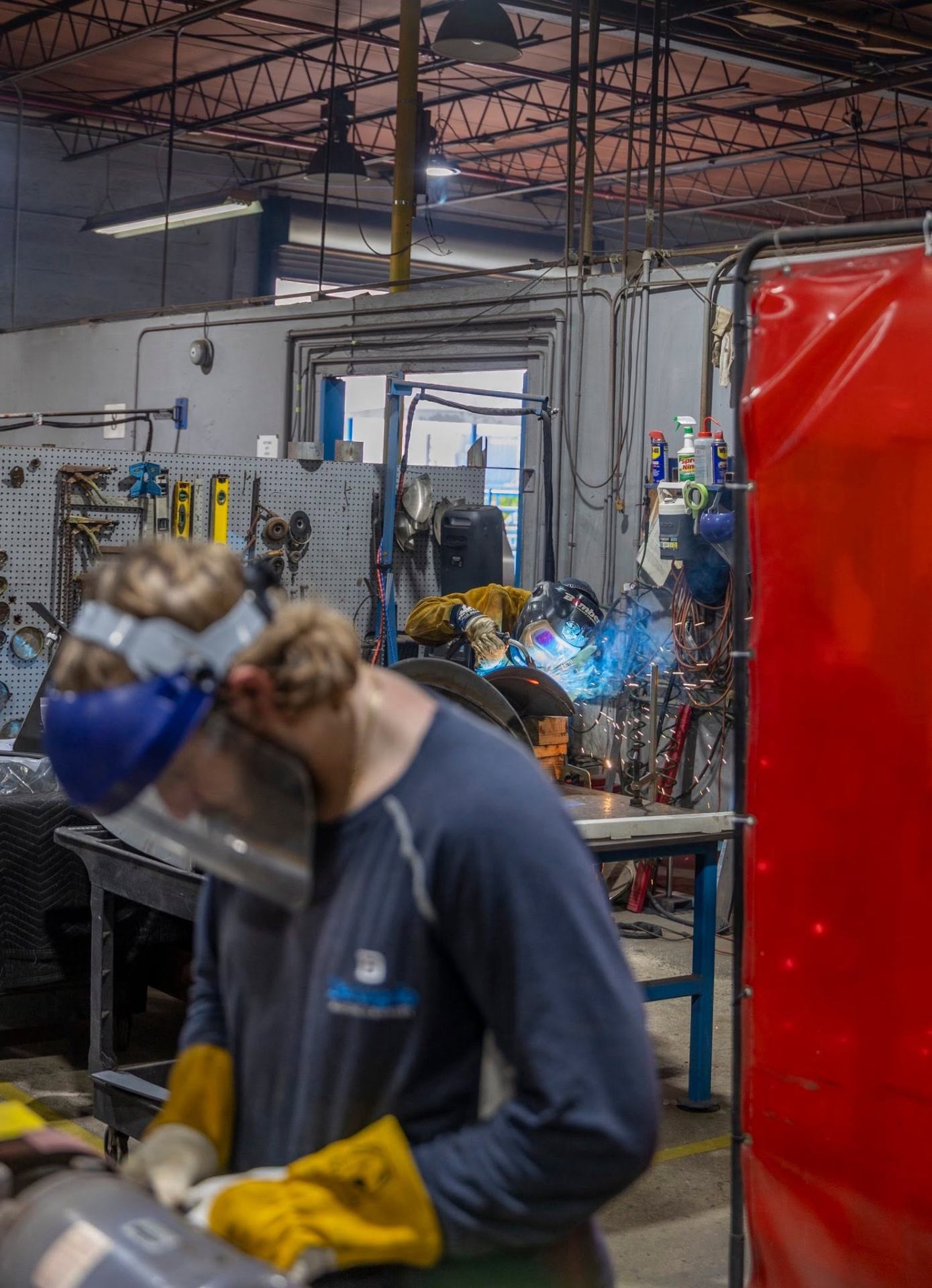 Two Welders, One Shop
