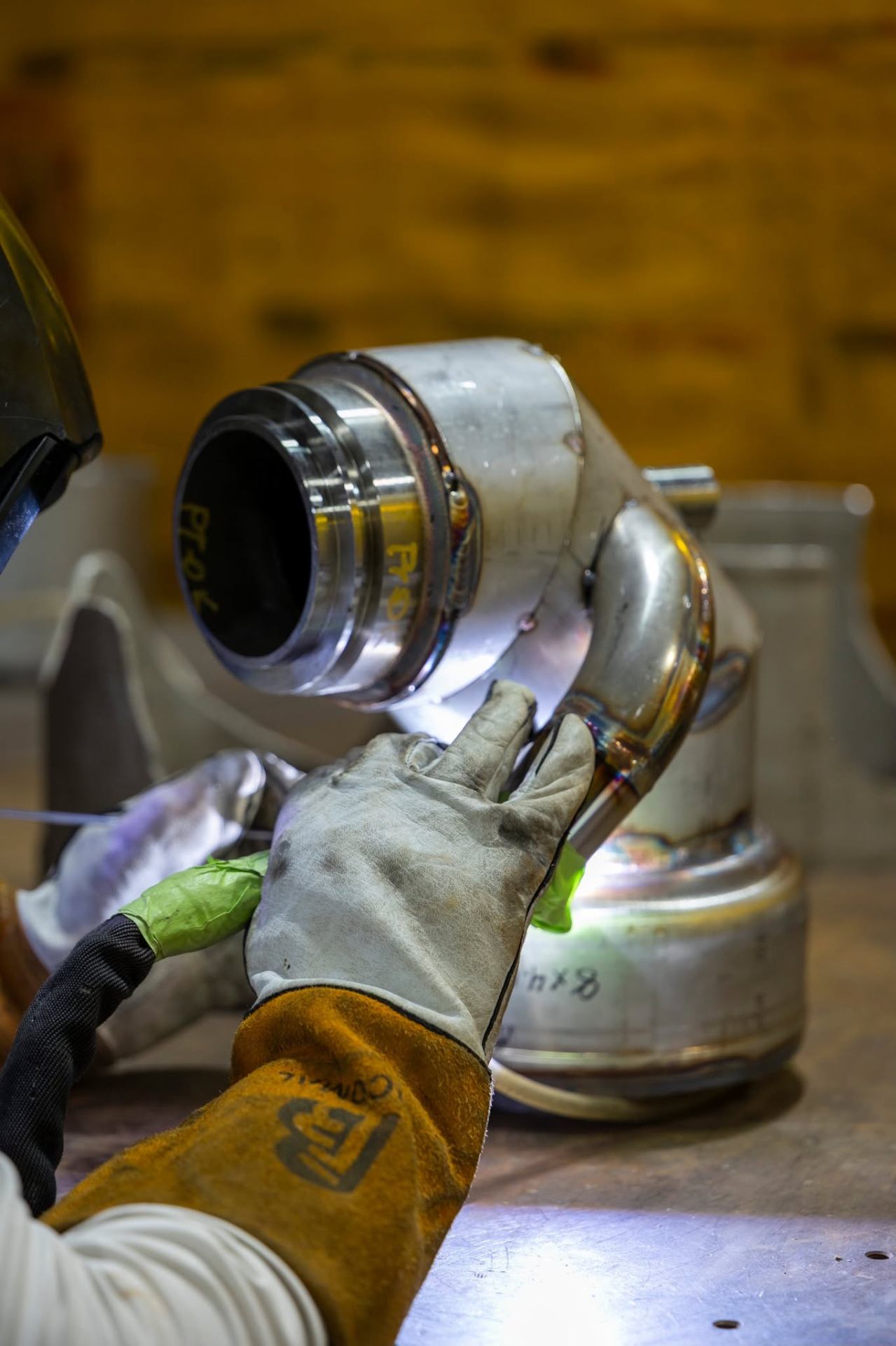 Welder Tacking a Stainless Elbow