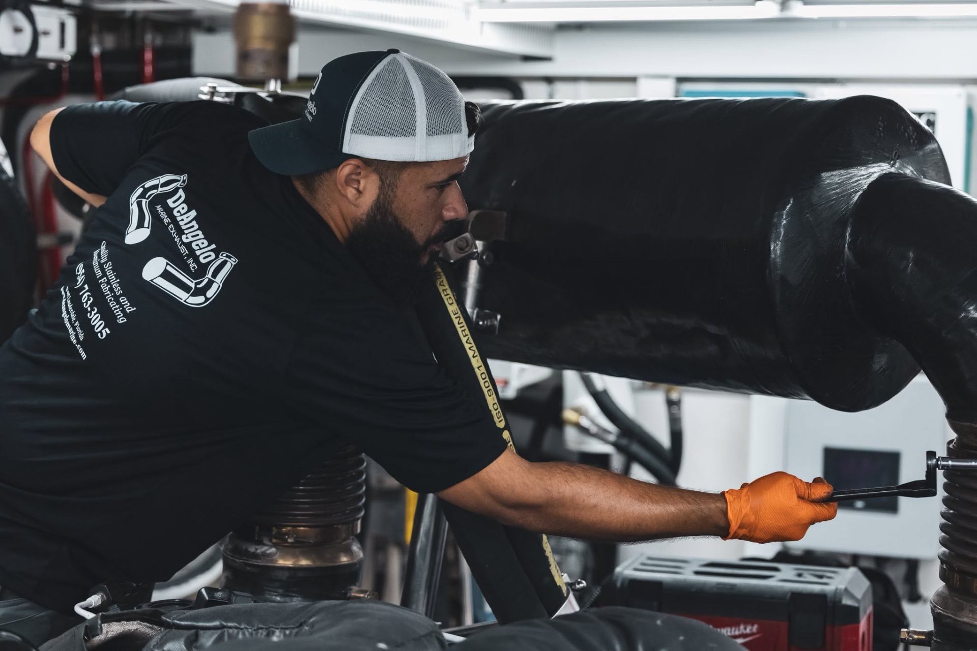 Technician Torquing an Exhaust Joint